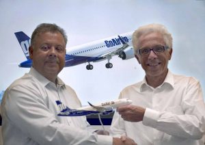 The delivery of India-based GoAir’s first of 72 A320neo aircraft on order is marked by (from left to right): Kiran Rao, Airbus EVP Strategy and Marketing, and GoAir CEO Wolfgang Prock-Schauer 