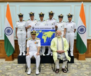 Prime Minister Narendra Modi, Chief of Naval Staff Admiral Sunil Lanba, Lt. Commander Vartika Joshi, and the crew comprises Lt. Commanders Pratibha Jamwal, P Swathi, and Lieutenants S Vijaya Devi, B Aishwarya and Payal Gupta.  