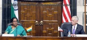 The Union Minister for Defence Nirmala Sitharaman and the US Secretary of Defence,  James Mattis issuing a Press Statement during media interaction.   Both are sitting with their national flags in the backdrop in the Defence Minister's office at South Block., in Delhi. 