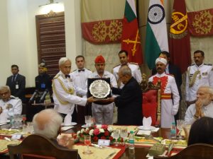 Chairman COSC & CNS, Admiral Sunil Lanba presenting a Memento to The Supreme Commander of the armed forces -the President of India, Pranab Mukherjee during the Farewell Banquet at Manekshaw Centre. Prime Minister Narendra Modi is also seen in the frame.