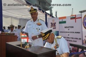 Admiral Sunil Lanba, Chief of the Naval Staff signing the visitors book