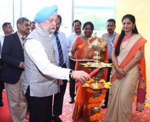 The Minister lighting the lamp at the inauguration 