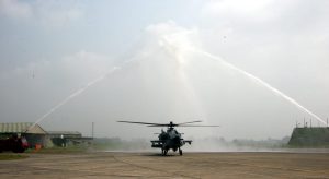 Apache getting the traditional water canon welcome before induction into IAF 