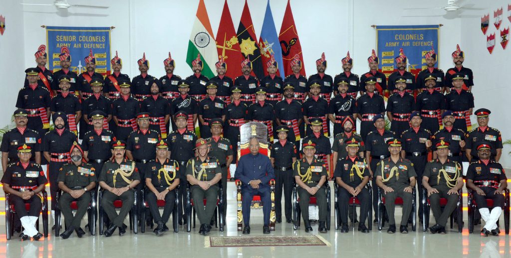 The Supreme Commander in a group photograph at the presentation of the Colours