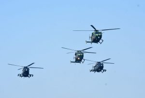 Apache helicopters fly over Rajpath