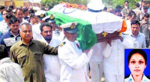 The coffin of Lt Kiran Shekhawat inset being taken for last rites in Mewat