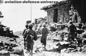 A patrol walks in the Haji Pir pass sector of Kashmir region.