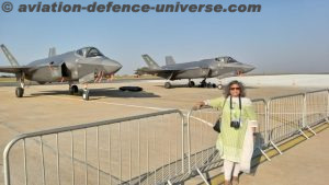 Sangeeta Saxena with the F-35 behind at Yelahanka Airbase