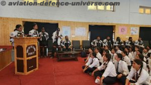 participants of expedition interacting with students at various schools