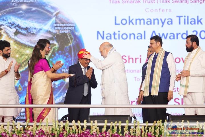 Union Home Minister and Minister of Cooperation Amit Shah presents the Lokmanya Tilak National Award 2026 to National Security Advisor Ajit Doval in Pune, Maharashtra